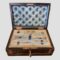 Main photo of Palais Royale sewing box seen with lid open revealing the tray of contents and the padded pale blue silk lining in the lid. The tray is mostly complete with its sewing instruments with just 2 or 3 gaps which are visible. Not bad considering it's coming up for 200 years old fairly soon!